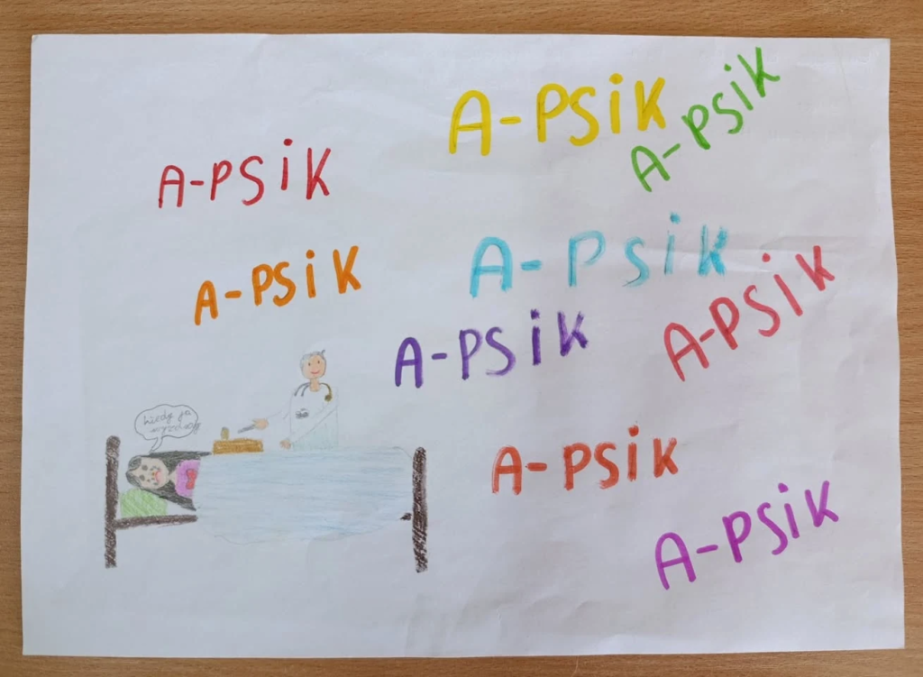 Praca konkursowa z napisem A-psik